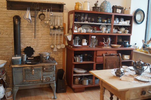 Old kitchen with oven and old kitchen utensils in the Jügesheim local history museum