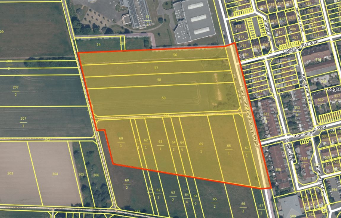 Widok z lotu ptaka na obszar z żółtymi granicami działek i obszarem zaznaczonym na czerwono przedstawiającym plan zagospodarowania D 32 w Dudenhofen