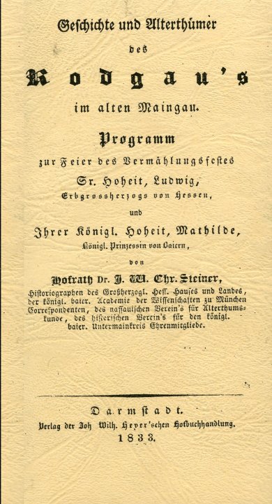 "Geschichte und Alterthümer des Rodgau's im alten Maingau" başlıklı eski yazı bir kitap kapağı görülebilir. Kitap deri bir cilde sahiptir.