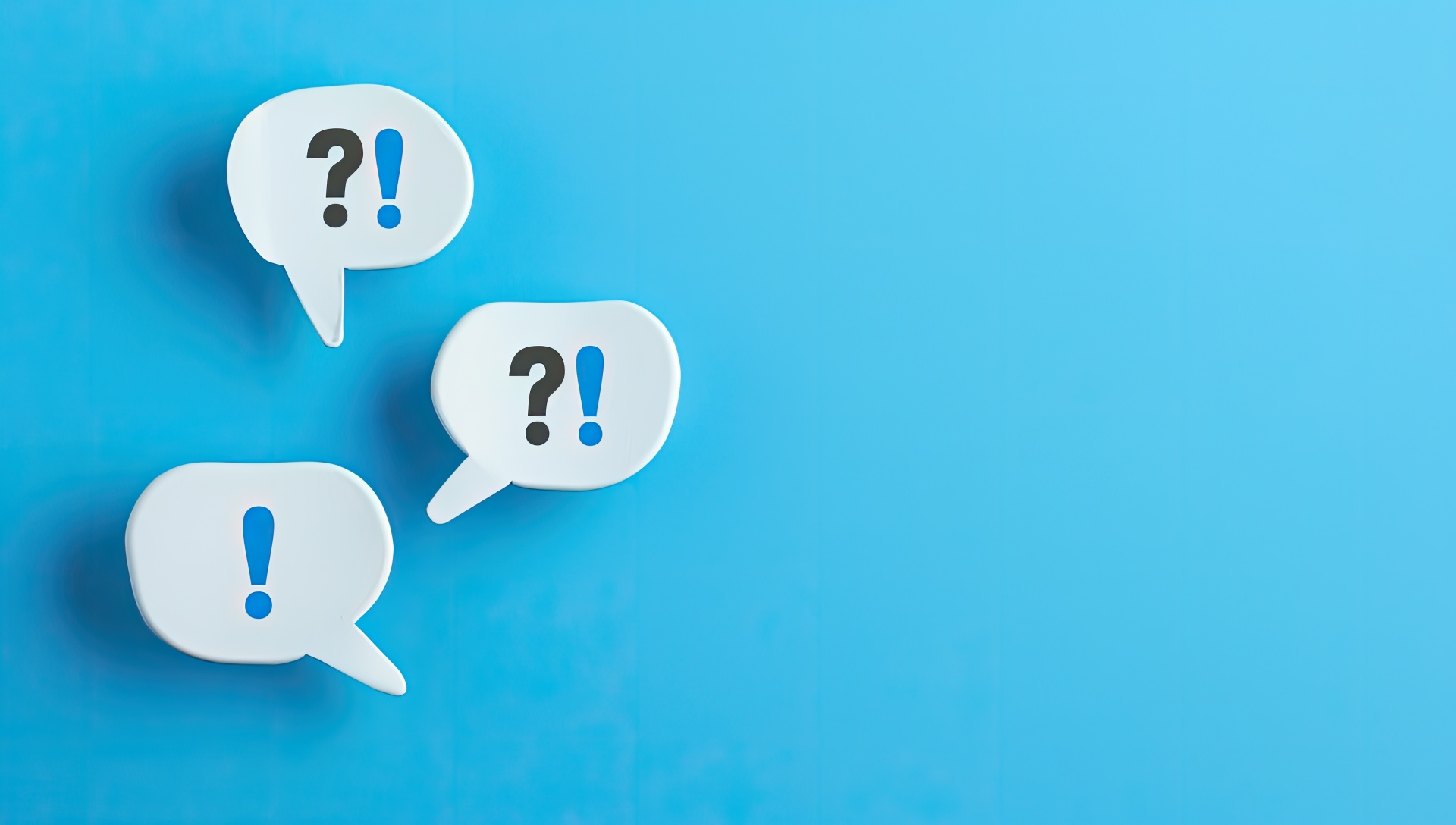 Two speech bubbles with exclamation and question symbols on a blue background.